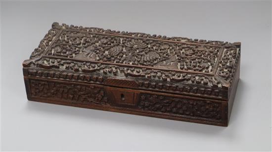 An Indian carved sandalwood glove box length 30cm